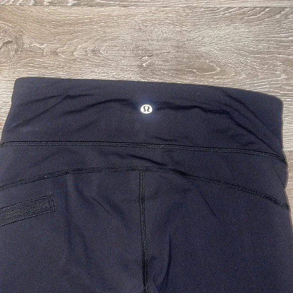 Lululemon athletica size 4 black crop leggings side zip pocket tulip hem capri - Picture 7 of 10
